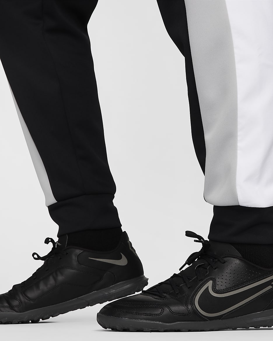 Black and white nike tracksuit bottoms best sale